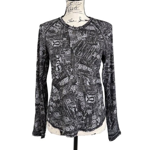 lululemon athletica Tops - Lululemon Rise & Run Long Sleeve Black White Top Tear It Up Alpine Women Size 8